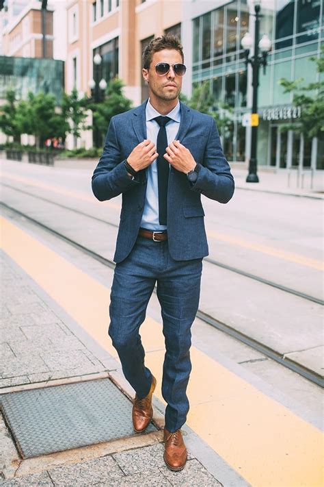 blue suit with brown boots.